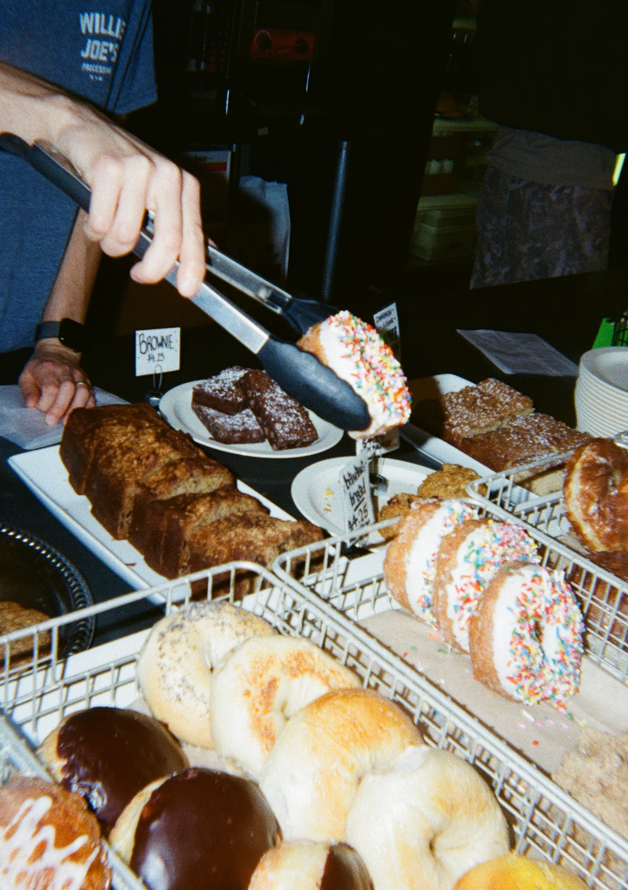 photo of barista serving pastry