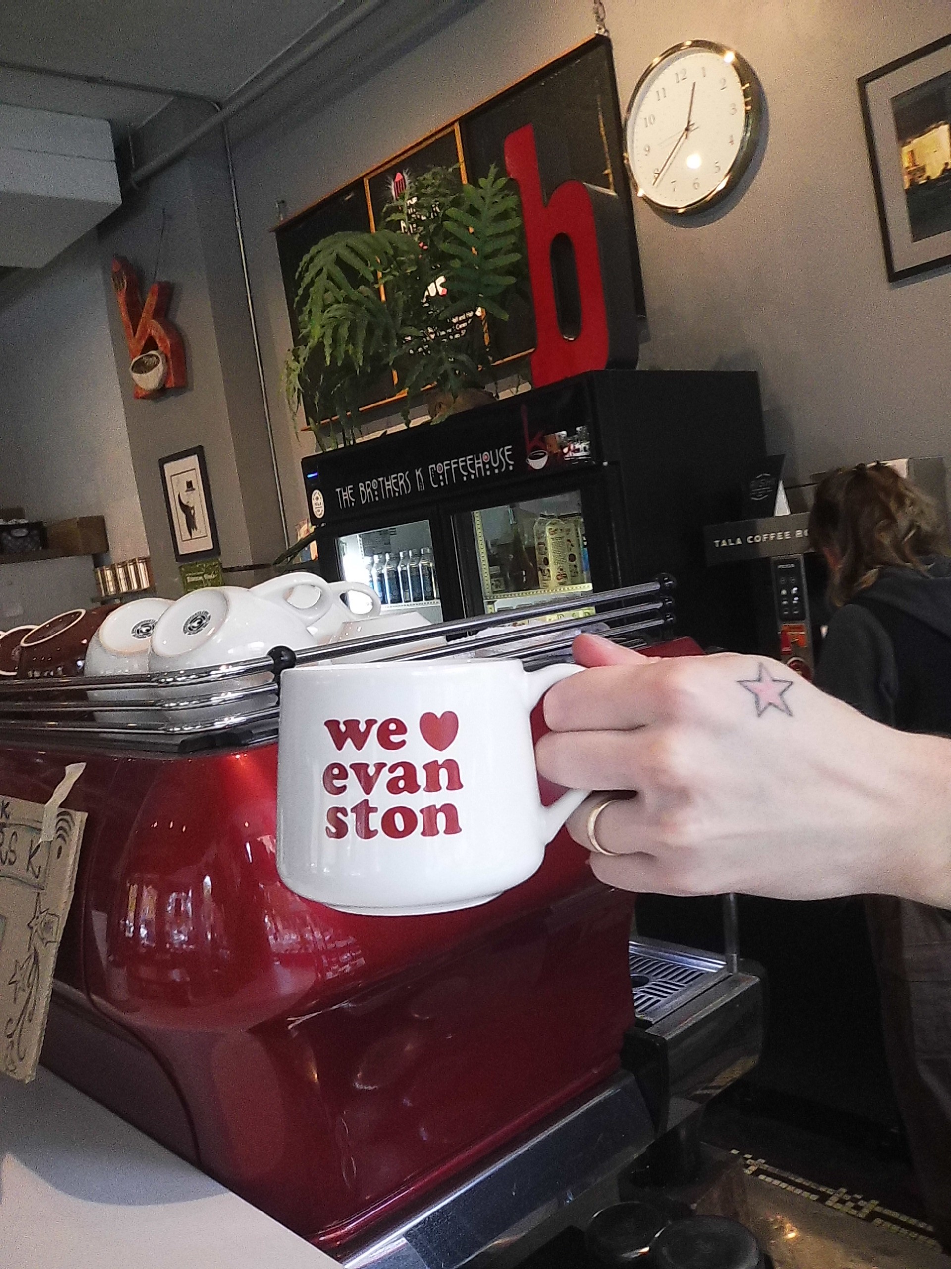 barista with mug