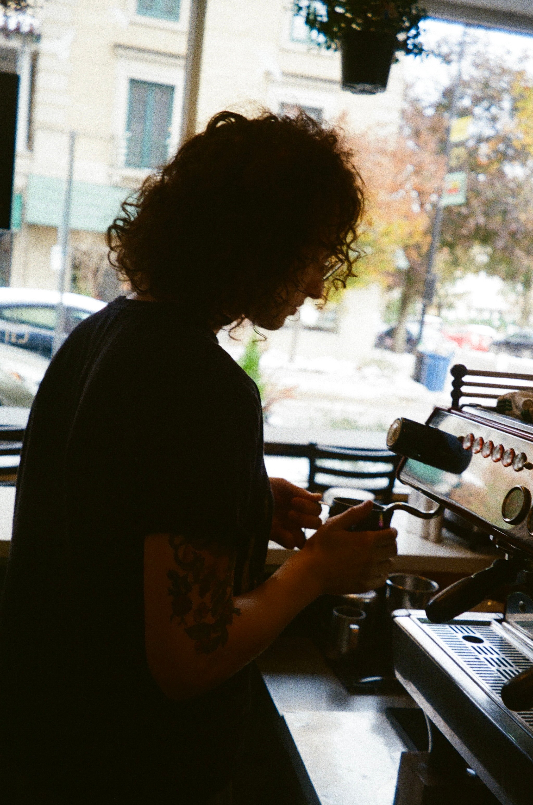 photo of barista at espresso machine