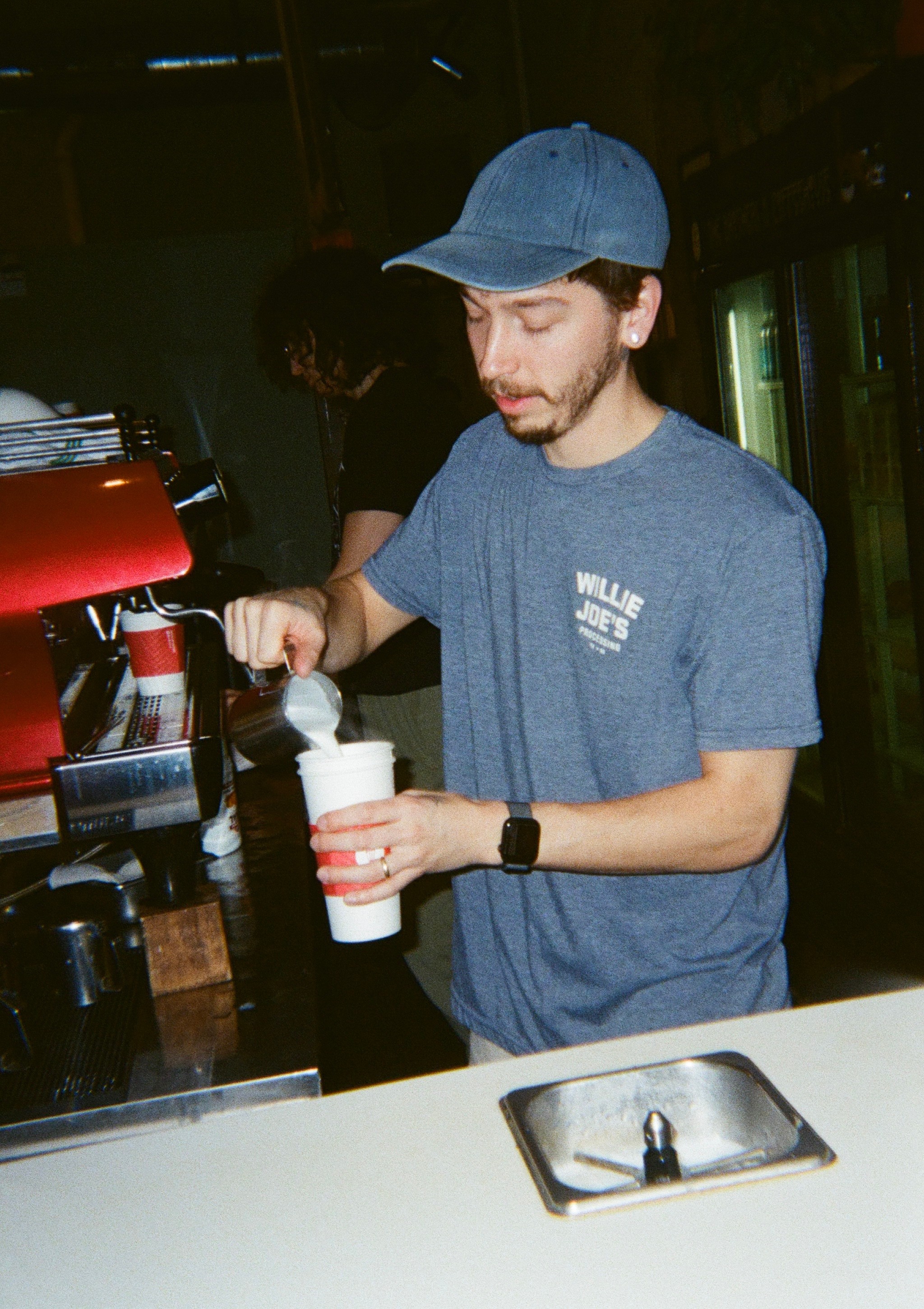 photo of Elijah making drink