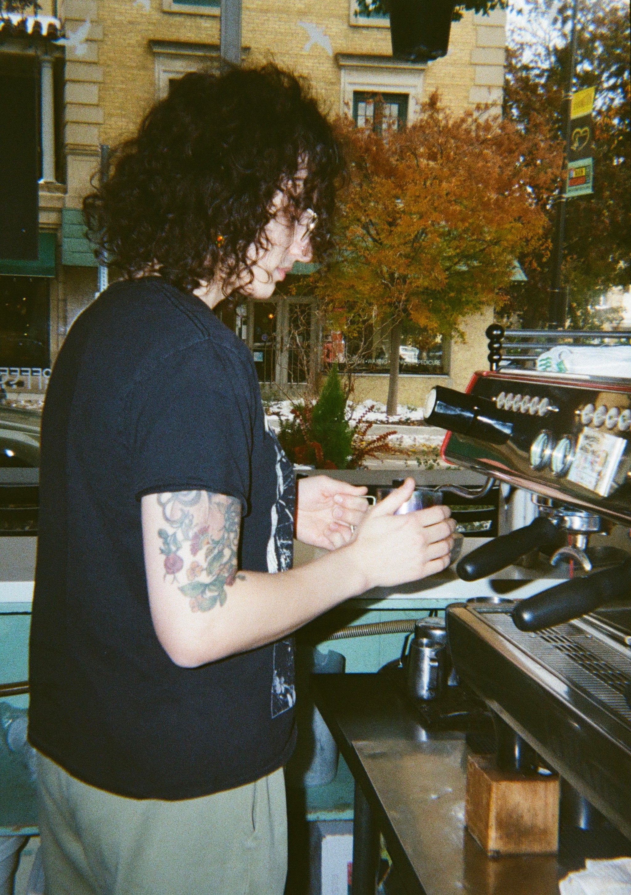 photo of barista at espresso machine